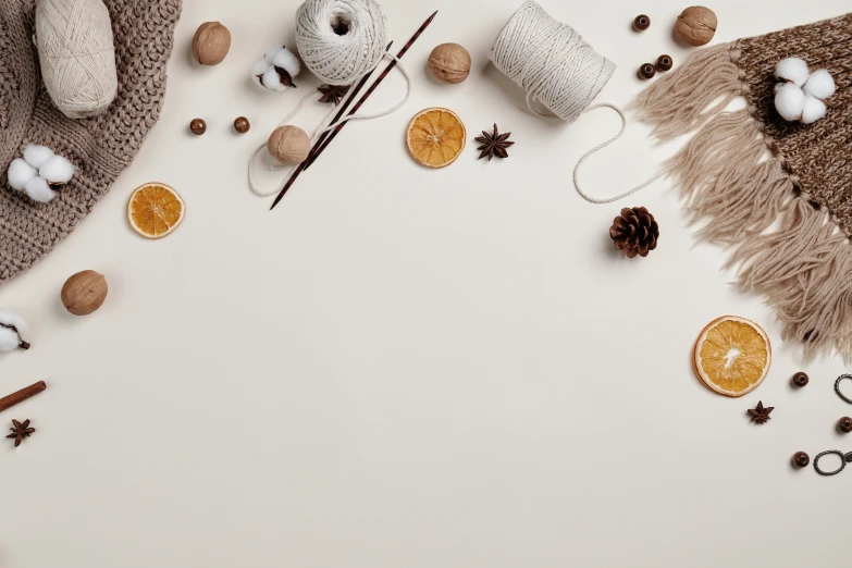 a white table topped with lots of different items, a still life, trending on pexels, made of wool, brown, background image, 9 9 designs