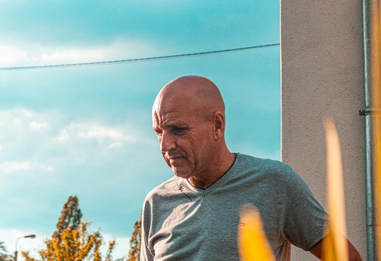 a man is looking at his cell phone, pexels contest winner, hyperrealism, handsome squidward, shot from roofline, color photograph portrait 4k, mr clean