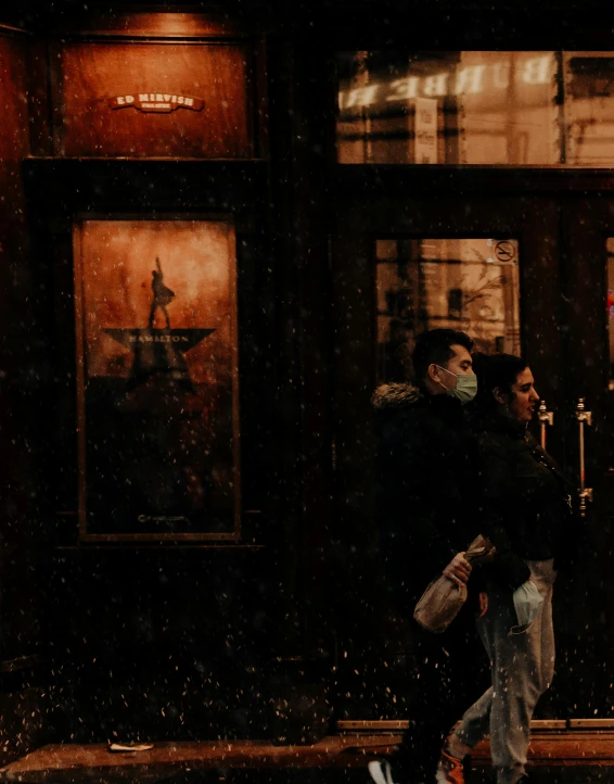 a group of people walking down a street in the rain, poster art, by Emma Andijewska, pexels contest winner, socialist realism, theater mask, leaning on door, taverns nighttime lifestyle, museum photo