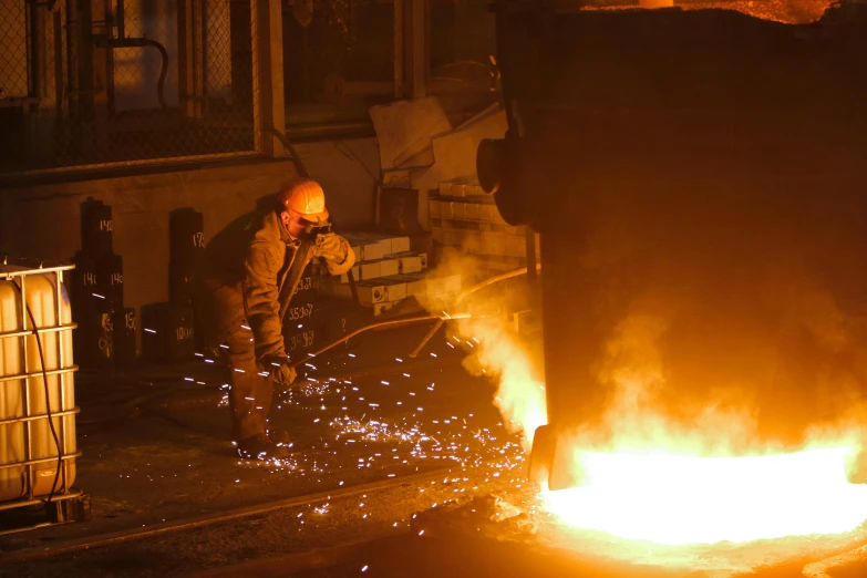 a man that is standing in front of a fire, steel mill, thumbnail, cast iron material, avatar image
