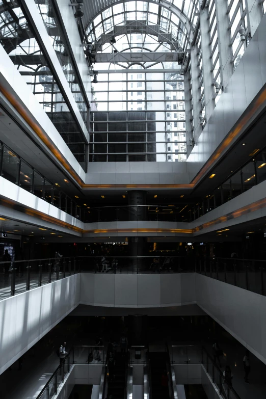 a group of escalators sitting inside of a building, lots of building, inside large window of ship, modernist buildings, dramatic lighting - n 9