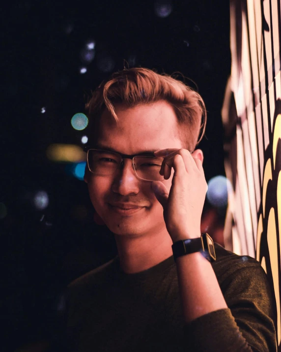 a close up of a person talking on a cell phone, by Cosmo Alexander, discord profile picture, jesper esjing, satisfied pose, wearing square glasses