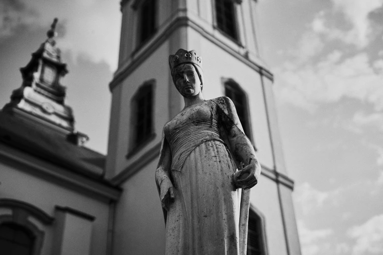 a black and white photo of a statue in front of a church, a statue, unsplash, renaissance, beautiful lady, biedermeier, beautiful queen, high quality upload