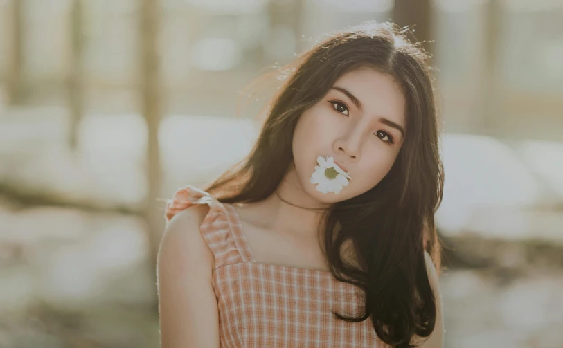 a woman with a flower in her mouth, pexels contest winner, asian girl with long hair, wearing a cropped top, garis edelweiss, {perfect face}