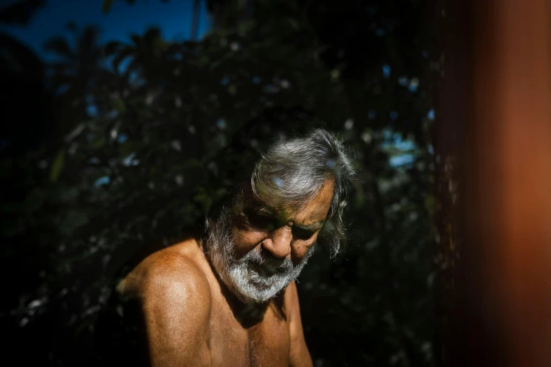 a man with a white beard and no shirt, pexels contest winner, indian forest, some dappled light, avatar image, old gray hair