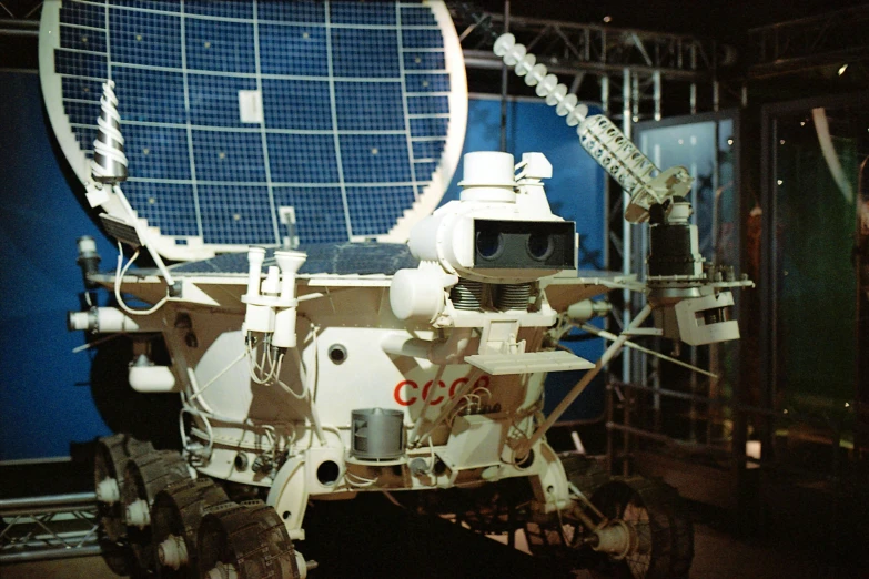 a close up of a vehicle with a solar panel on top of it, inspired by Choi Buk, vostok-1, 1980s photograph, moon mission, exhibition