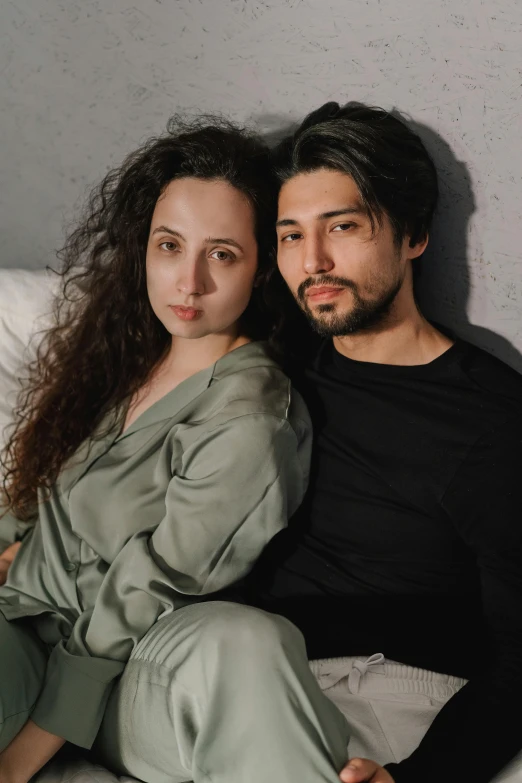 a man and a woman sitting on a bed, an album cover, pexels contest winner, ayanamikodon and irakli nadar, headshot profile picture, wearing a baggy pajamas, ilya kushinov