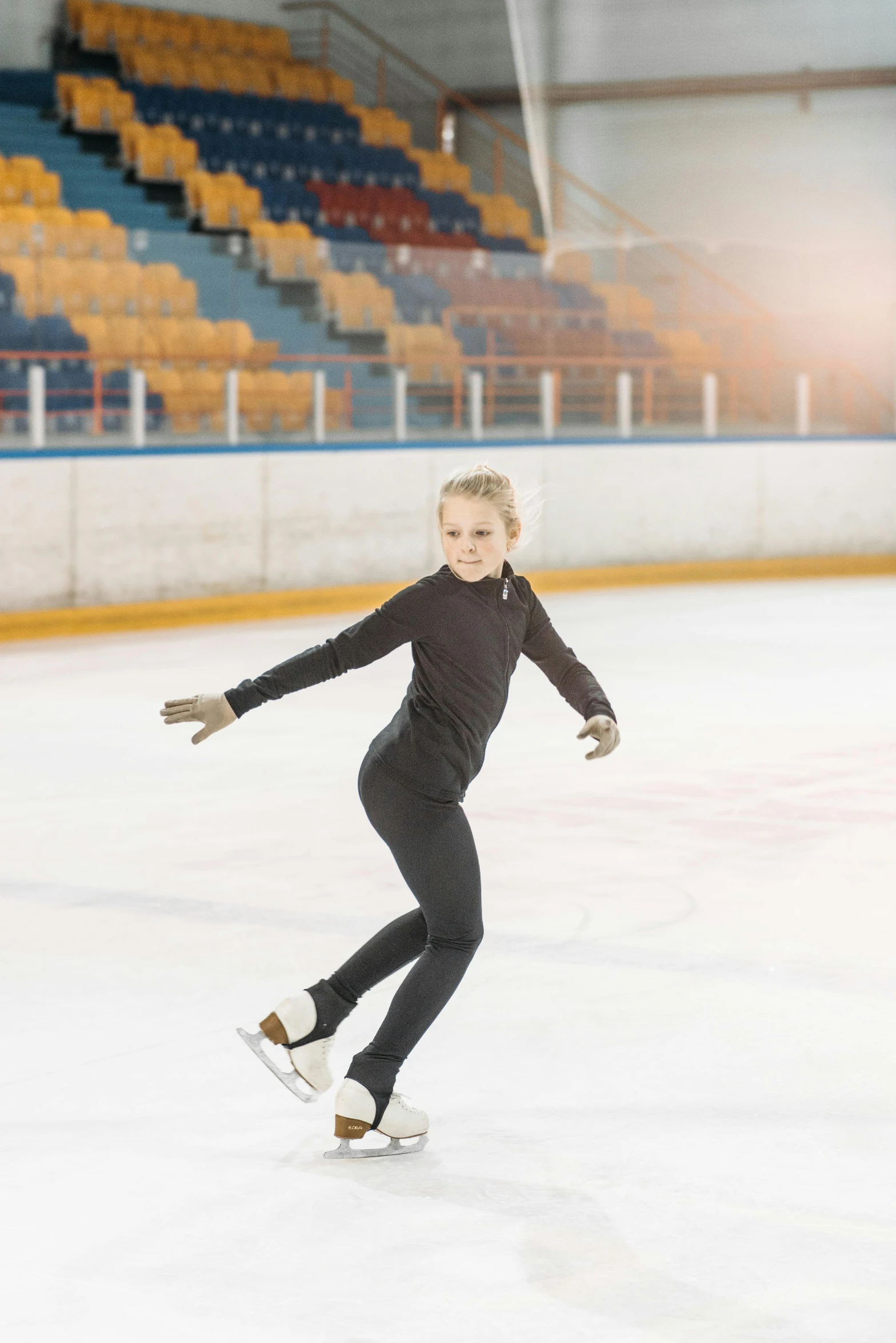 a female figure skating on an ice rink, a picture, shutterstock, arabesque, greta thunberg, 15081959 21121991 01012000 4k, square, panoramic view of girl