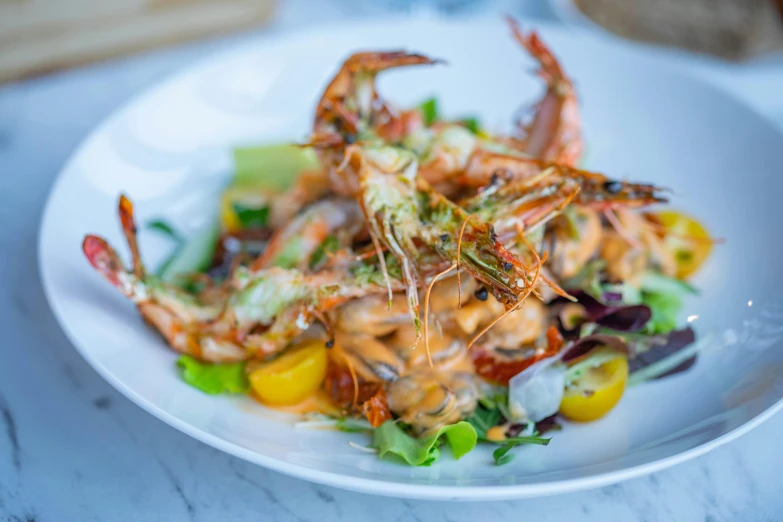 a close up of a plate of food on a table, prawn, profile image, cheesy, basil gogos