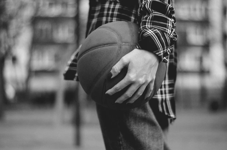 a black and white photo of a person holding a basketball, a black and white photo, 15081959 21121991 01012000 4k, hipster, instagram post, baggy