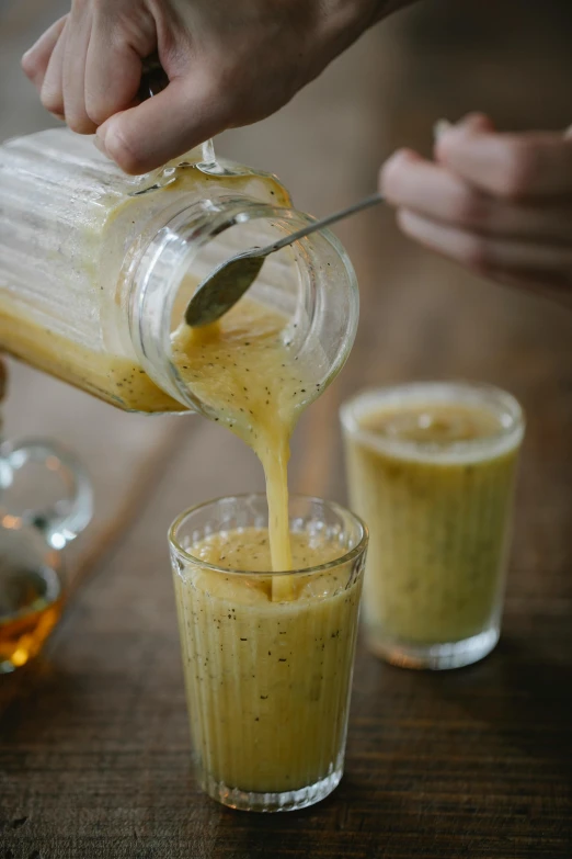 a person pouring a drink into a glass, by Tom Scott RSA, reddit, soup, ochre, carefully crafted, mason