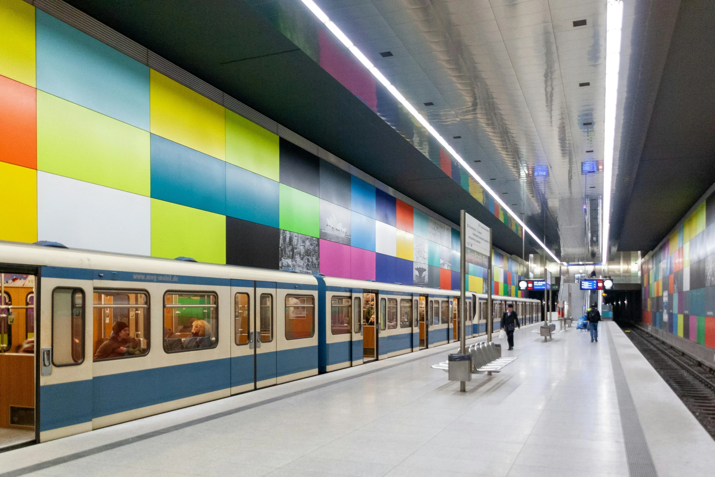 a subway train pulling into a train station, by karlkka, colorful building, architectural finishes, istván sándorfi, profile image