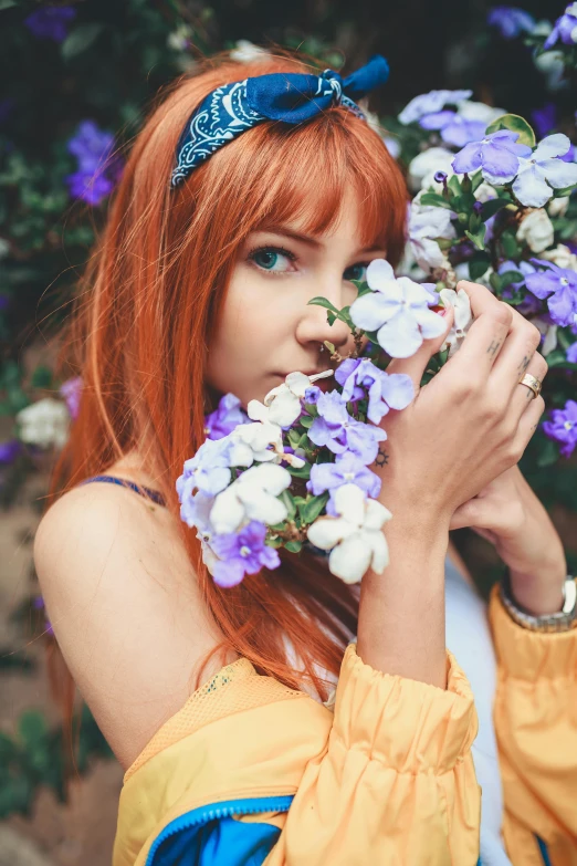 a woman holding a bunch of flowers in front of her face, a colorized photo, pexels contest winner, renaissance, cute young redhead girl, orange and purple color scheme, 15081959 21121991 01012000 4k, flirting