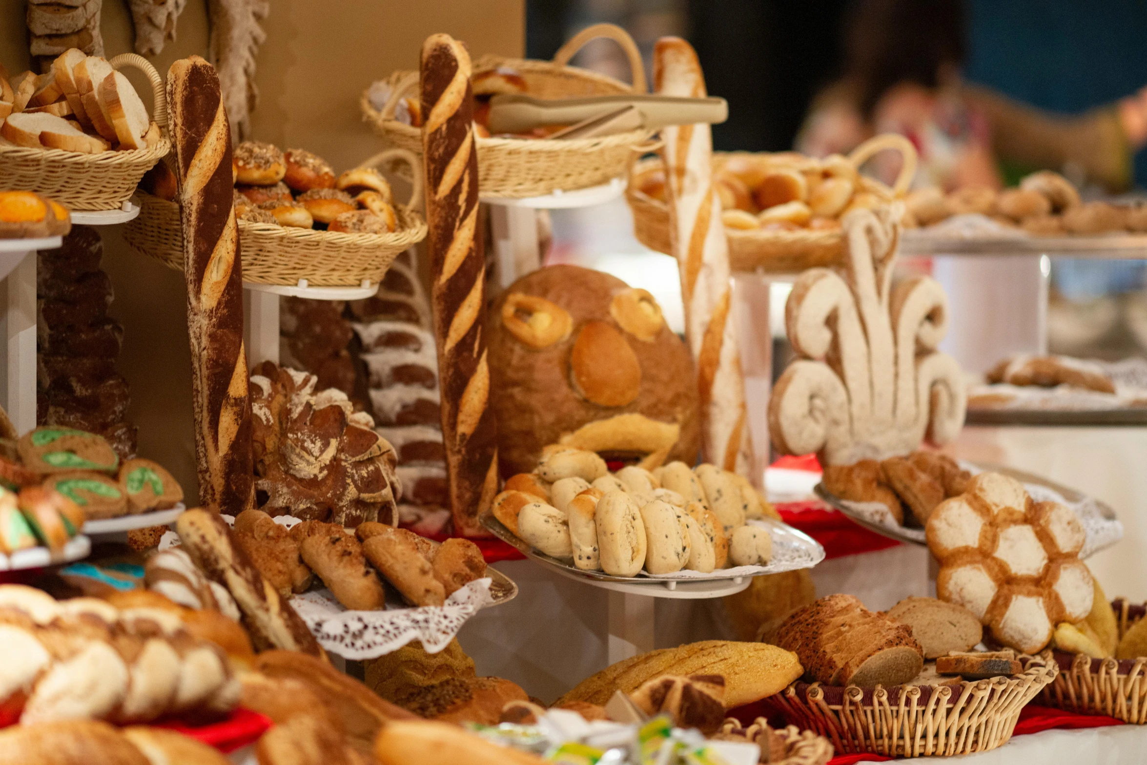 a table topped with lots of different types of bread, pexels contest winner, renaissance, breakfast buffet, avatar image, desserts, looking partly to the left