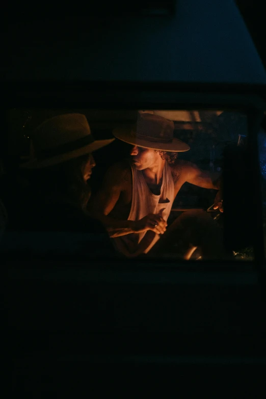 a man sitting in the passenger seat of a car at night, pexels contest winner, australian tonalism, cowgirl, looking into a mirror, medium shot of two characters, summertime