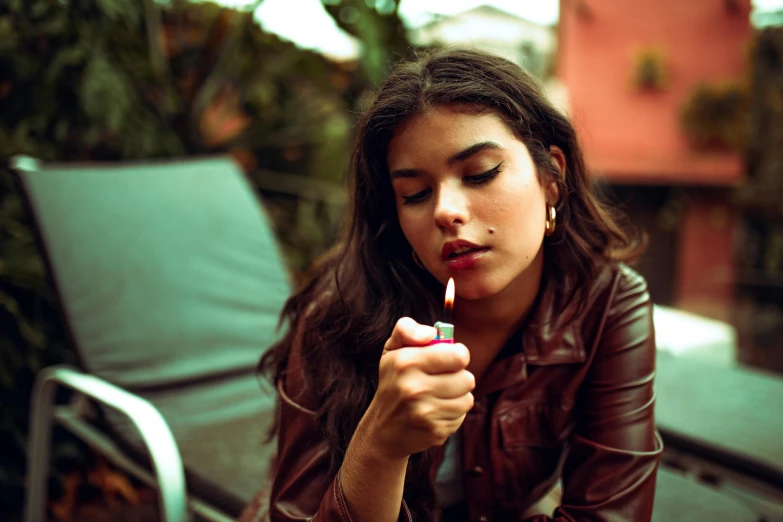 a woman in a leather jacket blowing a cigarette, inspired by Elsa Bleda, trending on pexels, :: madison beer, multicoloured, al fresco, justina blakeney