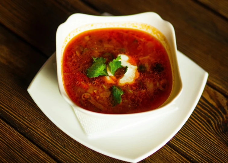 a bowl of soup sitting on top of a white plate, sovietwave, listing image, fan favorite, food photo