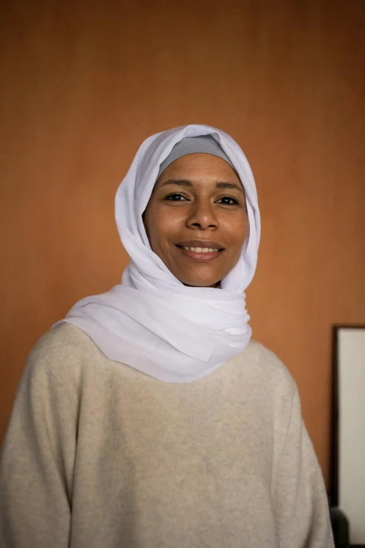 a close up of a person wearing a headscarf, mid length portrait photograph, teacher, full body image, with brown skin