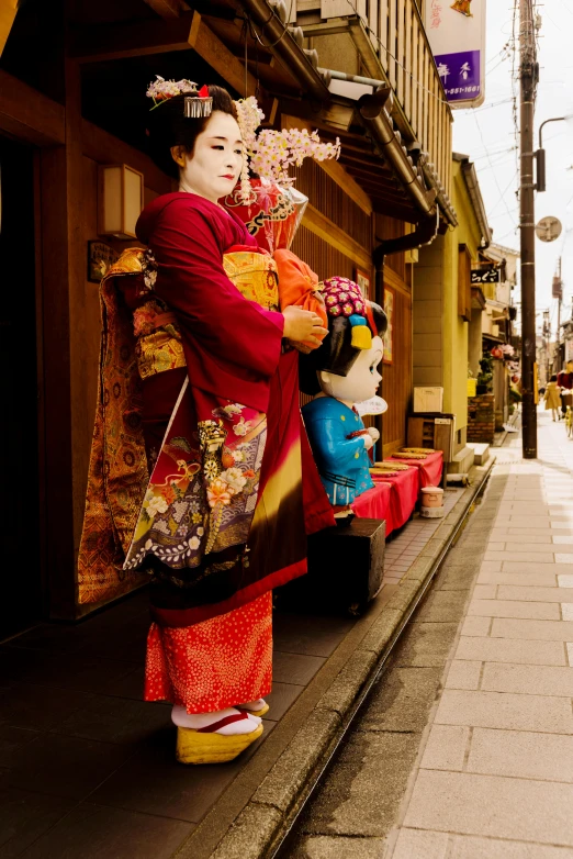 a woman in a kimono walking down a street, a statue, string puppet, in rich color, けもの, professional photo