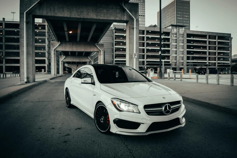 a white mercedes benz benz benz benz benz benz benz benz benz benz benz benz benz benz benz, by Julia Pishtar, pexels contest winner, fan favorite, medium wide front shot, in an urban setting, cleveland