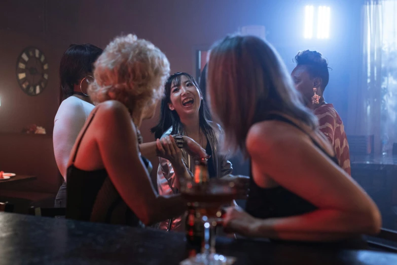 a group of women standing next to each other at a bar, a portrait, inspired by Nan Goldin, trending on pexels, happening, scene from live action movie, an asian woman, scene from a rave, a still of a happy