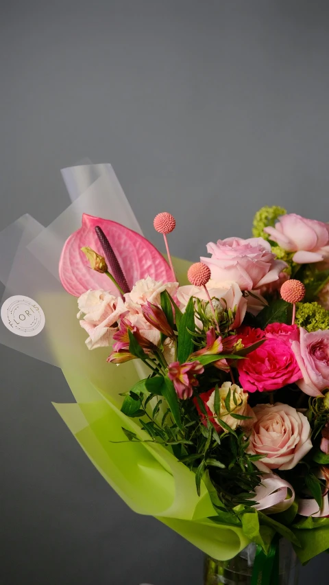 a bouquet of flowers in a vase on a table, pink mist, no cropping, product shot, 'groovy'