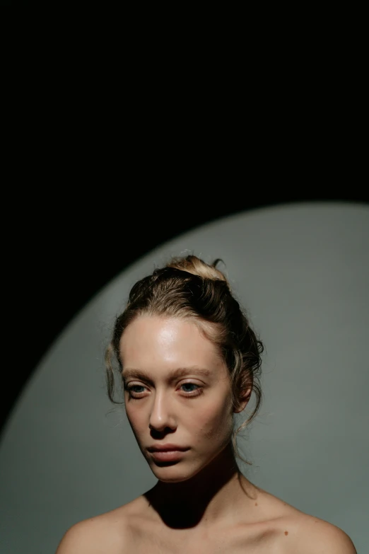a woman standing in front of a mirror, a character portrait, inspired by Jan Lievens, unsplash, hyperrealism, white moon and black background, sydney sweeney, detailed face of an android, taken in the late 2010s