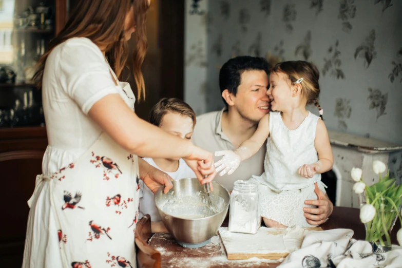 a couple of people that are in the kitchen, by Emma Andijewska, pexels, happy family, covered in white flour, avatar image, mini model