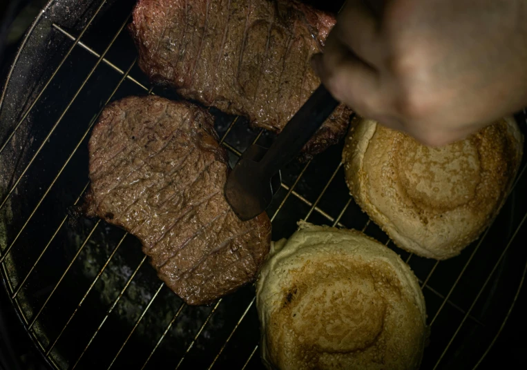 a close up of a person cooking food on a grill, profile image, fan favorite, steakpunk, hamburger