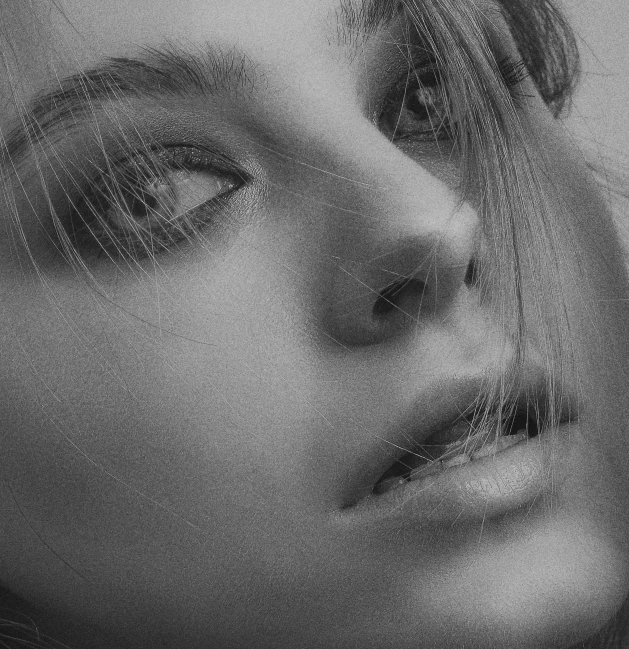 a black and white photo of a woman with long hair, by irakli nadar, digital art, cara delevingne, close up of face, monochrome 3 d model, dreamy mila kunis