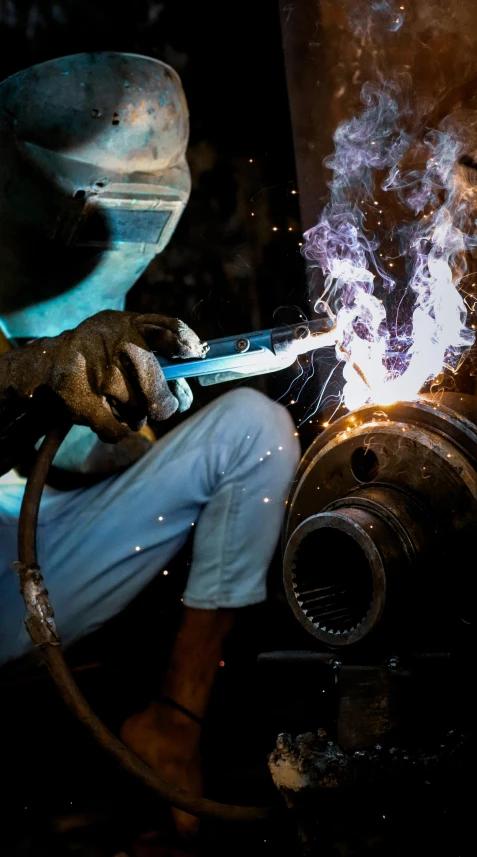 a welder working on a piece of metal, by Tobias Stimmer, lpoty, adafruit, instagram photo, thumbnail