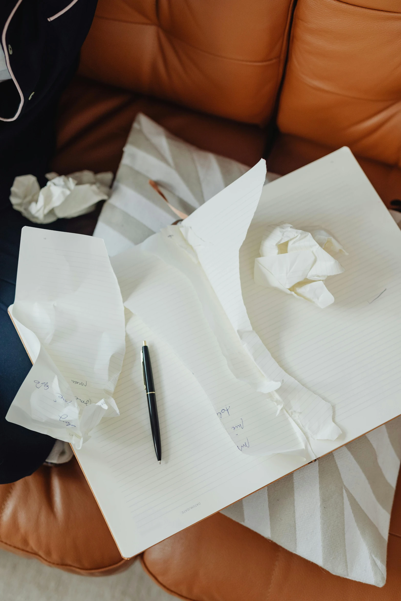 a pile of papers sitting on top of a couch, an abstract drawing, by Daniel Seghers, pexels contest winner, writing a letter, tears, porcelain organic tissue, wedding