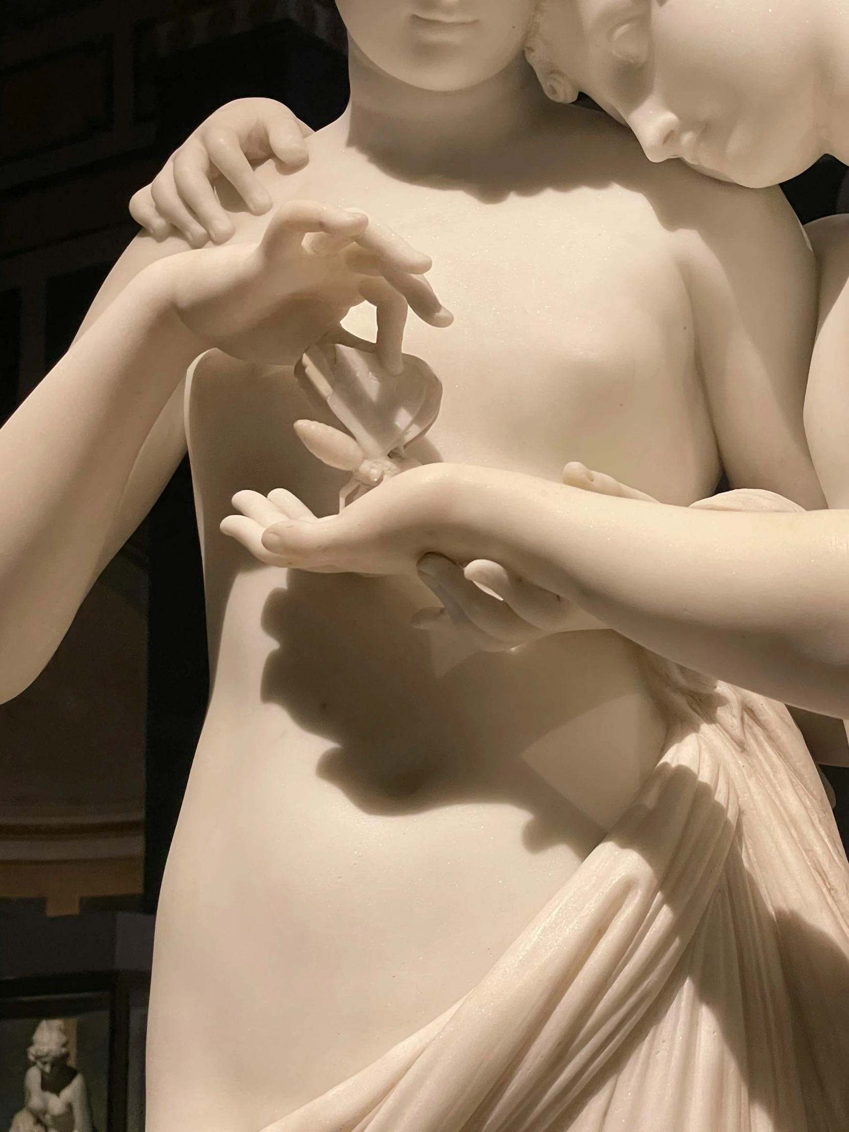 a couple of statues standing next to each other, by Gian Lorenzo Bernini, skin detail, pale milky white porcelain skin, partially cupping her hands, phone photo