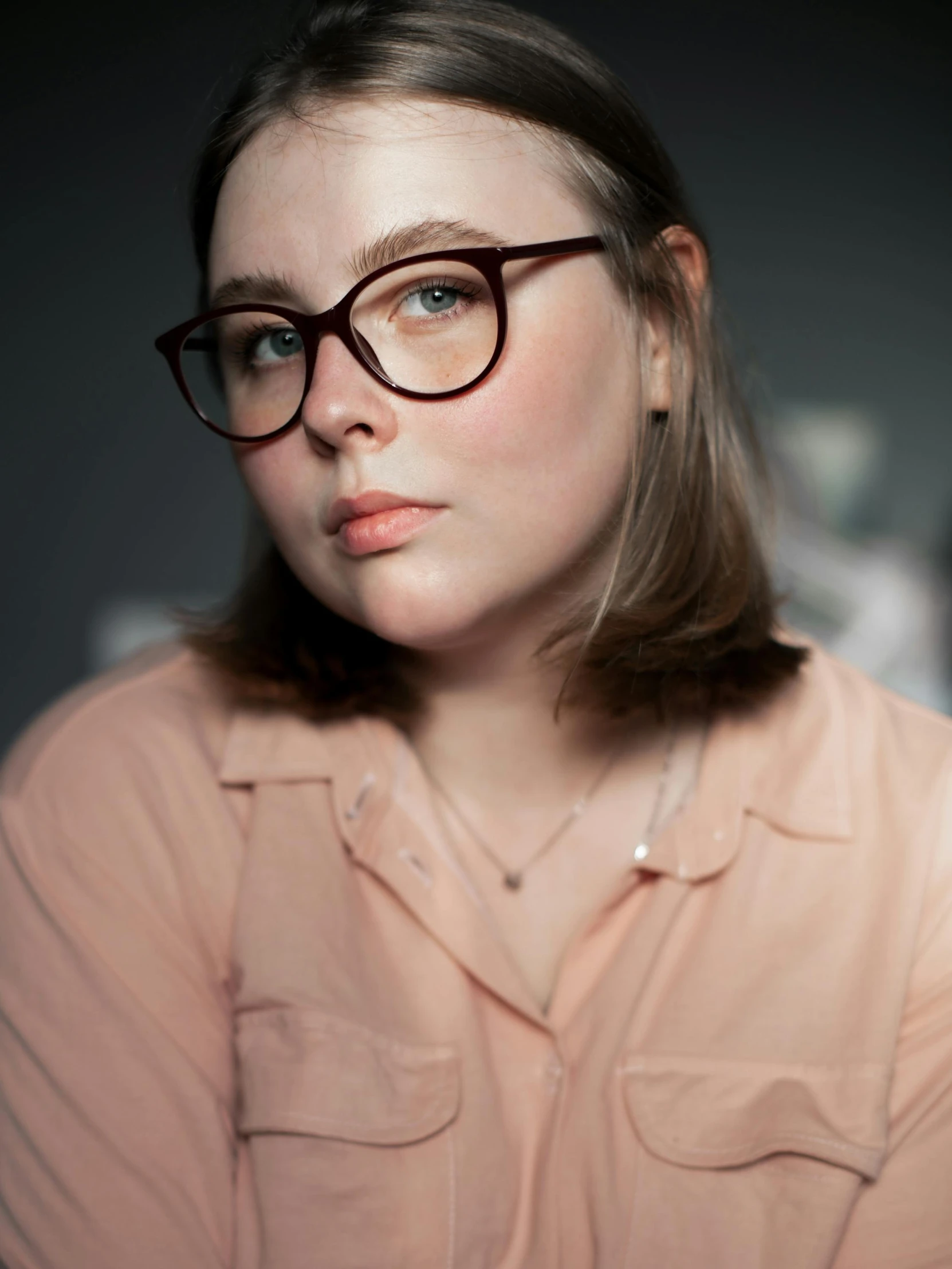 a close up of a person wearing glasses, a character portrait, inspired by Elsa Bleda, trending on pexels, smooth pale skin, product introduction photo