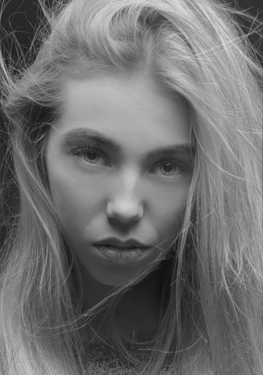 a black and white photo of a woman with long hair, a black and white photo, inspired by Peter Basch, photorealism, resembling a mix of grimes, ethereal!!! ultra realistic, blonde woman, staring at you