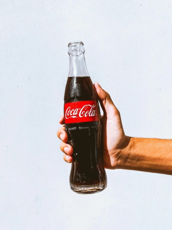 a person holding a bottle of coca cola, pexels contest winner, hyperrealism, unsplash transparent, 👅 👅, transparent background, traditional medium