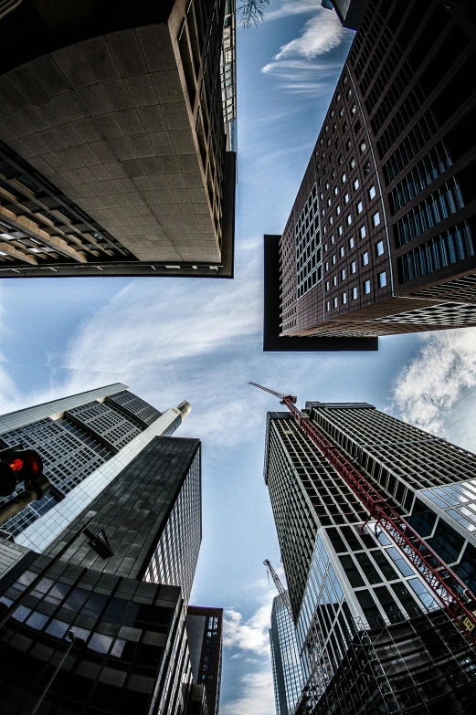 a group of tall buildings in a city, by Tobias Stimmer, pexels contest winner, gopro photo, toronto, high resolution, low - level view