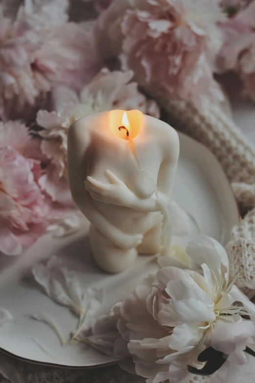 a white candle sitting on top of a white plate, a marble sculpture, loving embrace, albino mystic, soft bloom lighting, singularity sculpted �ー etsy