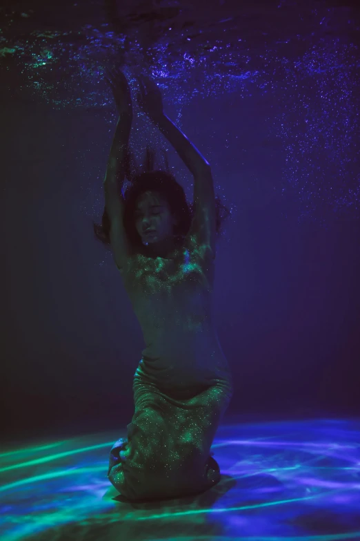 a man that is standing in the water, an album cover, inspired by Elsa Bleda, shanina shaik as medusa, “zendaya, pose 4 of 1 6, vhs colour photography