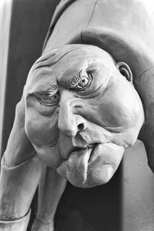 a black and white photo of a statue of an old man, a surrealist sculpture, inspired by Yue Minjun, trending on zbrush central, tongue out, closeup at the faces, sculpture of a woman, made of clay