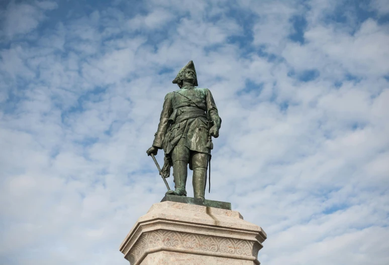 a statue of a man standing on top of a pedestal, a statue, inspired by Carl Frederik von Breda, unsplash, general uniform, square, tiepolo, fan favorite