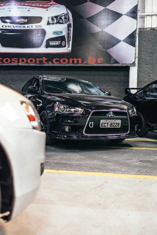 a couple of cars parked next to each other, caio santos, profile image, indoor picture, 2263539546]