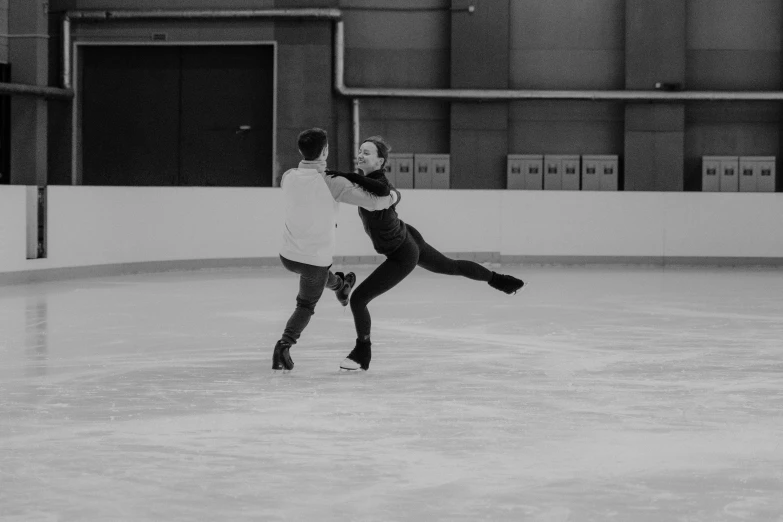 a man and a woman skating on an ice rink, a black and white photo, pexels contest winner, arabesque, the olympics footage, instagram picture, animation, combat pose