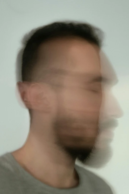 a blurry photo of a man with his eyes closed, a picture, inspired by Anna Füssli, beard stubble, an ai generated image, soft shadow transition, headshot profile picture