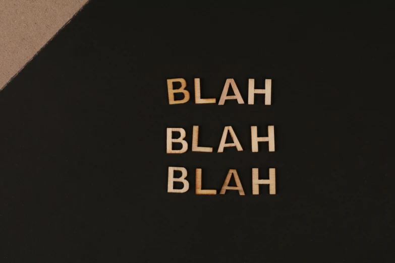 a close up of a black book with gold lettering, by Colin McCahon, trending on unsplash, blame!, laugh, billie eilish, shocked