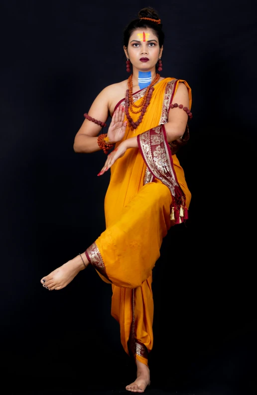 a woman in a yellow sari dancing, a statue, inspired by Raja Ravi Varma, flickr, full body 8k, nepal, studio photo, deity)