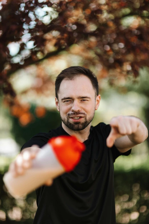 a man is throwing a frisbee in the park, by Sebastian Spreng, holding hot sauce, headshot profile picture, programming, discord profile picture