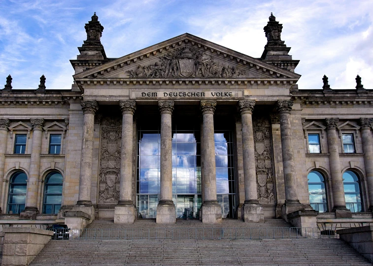 a large building with a clock on the front of it, pexels contest winner, berlin secession, classical stone columns, frank gehry, promo image, lecture halls and gambling dens