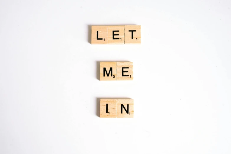 scrabbles spelling let me in on a white background, by Anton Lehmden, trending on unsplash, letterism, background image, medium format, taken with sony alpha 9, wooden