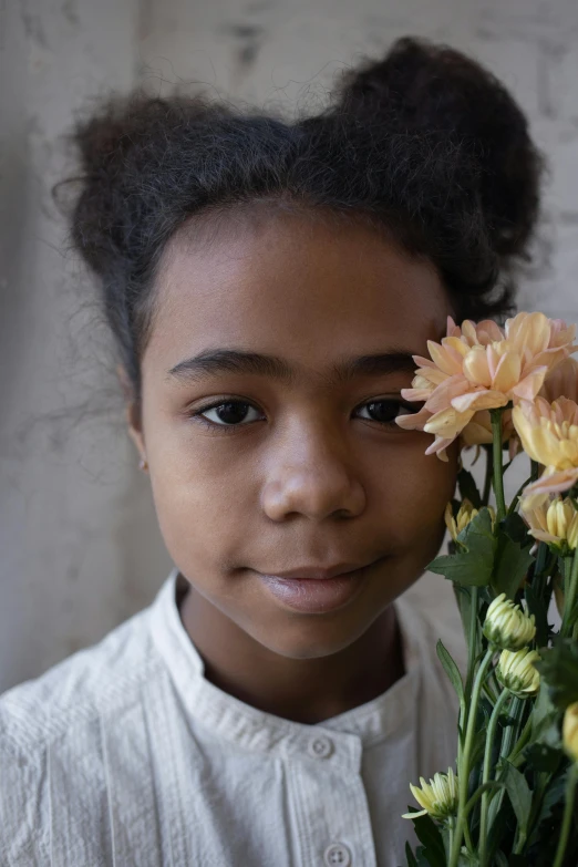 a young girl holding a bunch of flowers, inspired by Gordon Parks, trending on unsplash, light-brown skin, full frame image, thoughtful, close up portrait photo